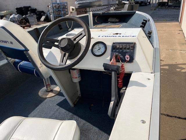 1992 Starcraft FM 160C boat interior with steering wheel and control panel.