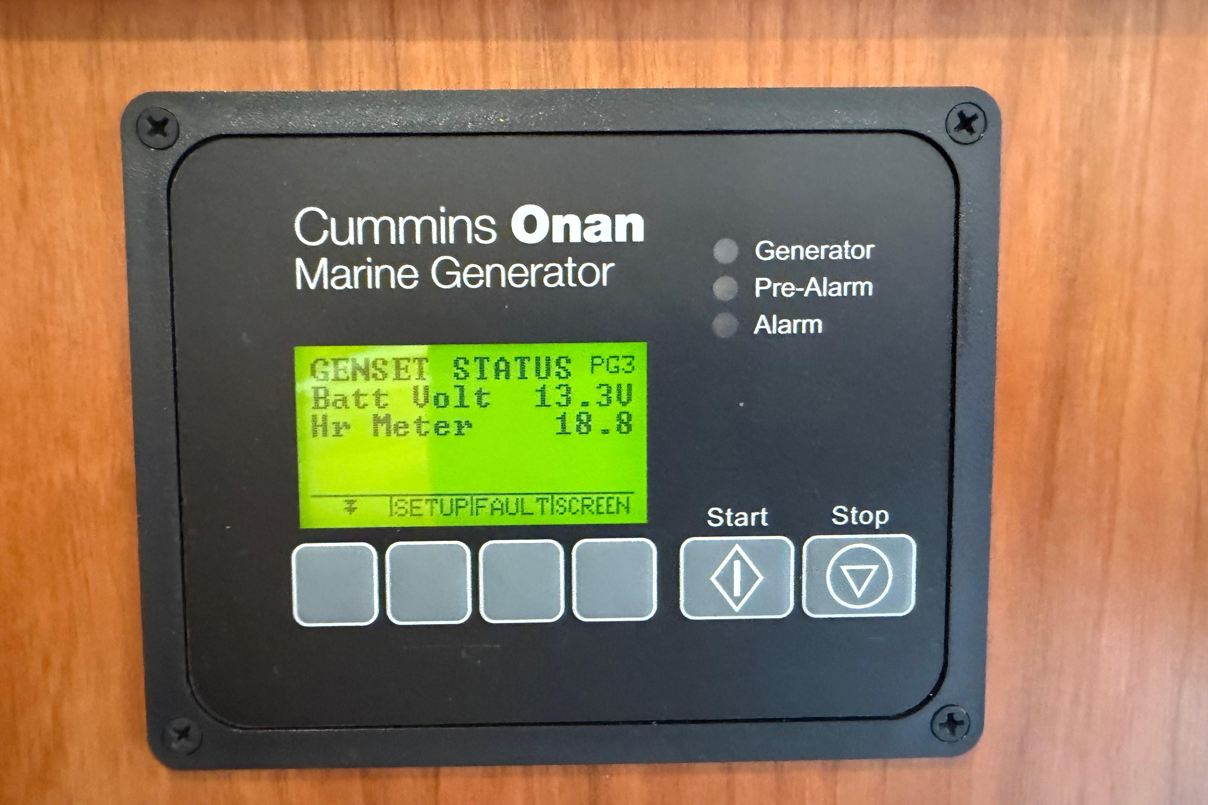 Cummins Onan marine generator display on 2023 Back Cove 340, showing battery voltage and hour meter.