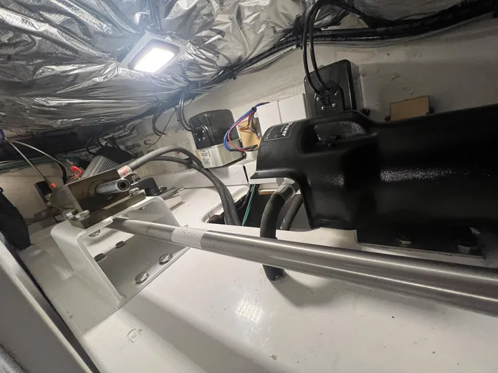 Seven Yacht Photos Pics Engine room of a 2018 Princess V58 yacht, showcasing mechanical components and wiring.