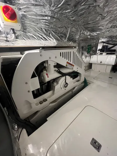 Seven Yacht Photos Pics Engine room of 2018 Princess V58 yacht with machinery and metallic insulation.