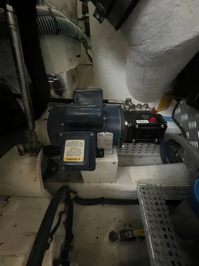 Seven Yacht Photos Pics Engine room of a 2018 Princess V58 yacht, showcasing mechanical components and equipment.