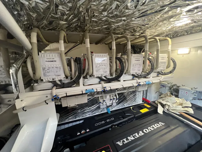 Seven Yacht Photos Pics Engine room of 2018 Princess V58 yacht with Volvo Penta components and wiring.