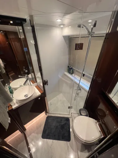 Seven Yacht Photos Pics Luxurious bathroom in 2018 Princess V58 yacht with modern fixtures and elegant design.