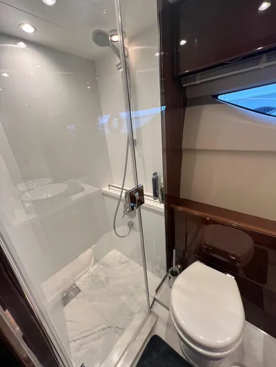 Seven Yacht Photos Pics Luxurious bathroom in 2018 Princess V58 yacht with modern shower and toilet.