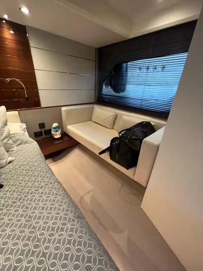 Seven Yacht Photos Pics Luxurious interior of 2018 Princess V58 yacht with modern seating and decor.