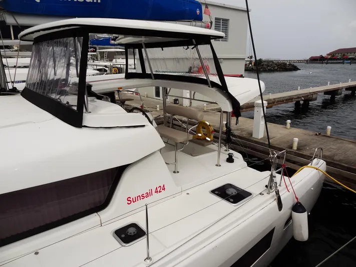 Blind Ambition II Yacht Photos Pics Lagoon 42 catamaran, 2020 model, docked at marina with Sunsail 424 marking.