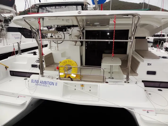 Blind Ambition II Yacht Photos Pics Lagoon 42 catamaran, 2020 model, named Blind Ambition II docked at a marina.