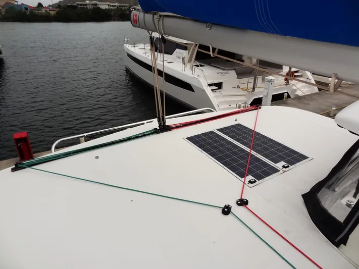Blind Ambition II Yacht Photos Pics Lagoon 42 catamaran (2020) with solar panel docked at marina.