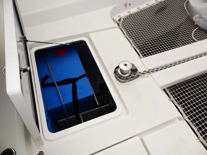 Blind Ambition II Yacht Photos Pics Lagoon 42 2020 yacht deck with open storage compartment and anchor chain.