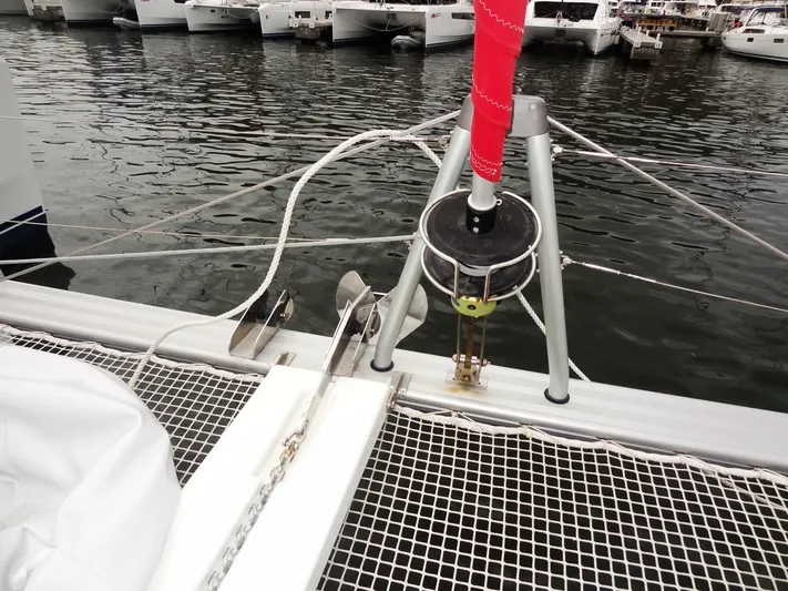 Blind Ambition II Yacht Photos Pics Bow of Lagoon 42 catamaran (2020) with anchor and netting at marina.