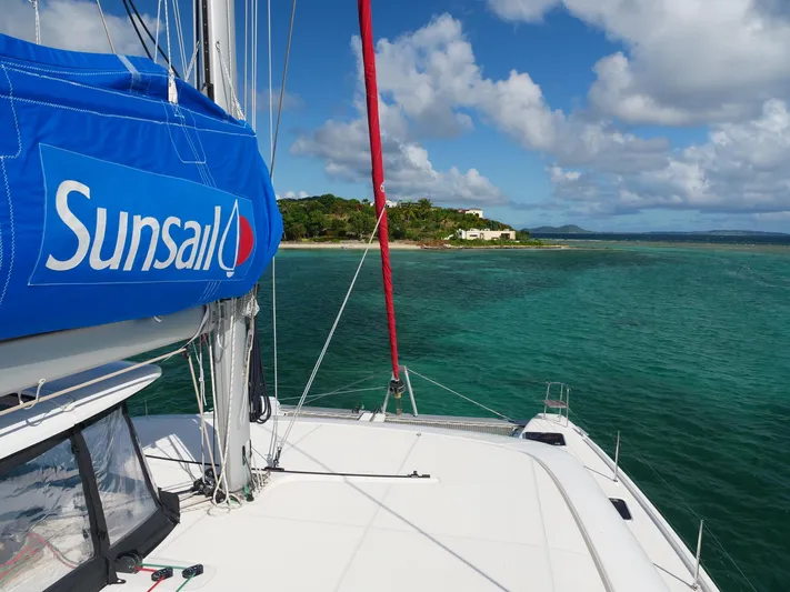 Blind Ambition II Yacht Photos Pics Lagoon 42 catamaran sailing near tropical island, 2020 model.