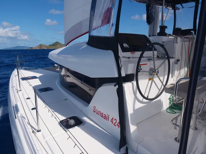 Blind Ambition II Yacht Photos Pics Lagoon 42 catamaran sailing in clear blue waters, 2020 model.