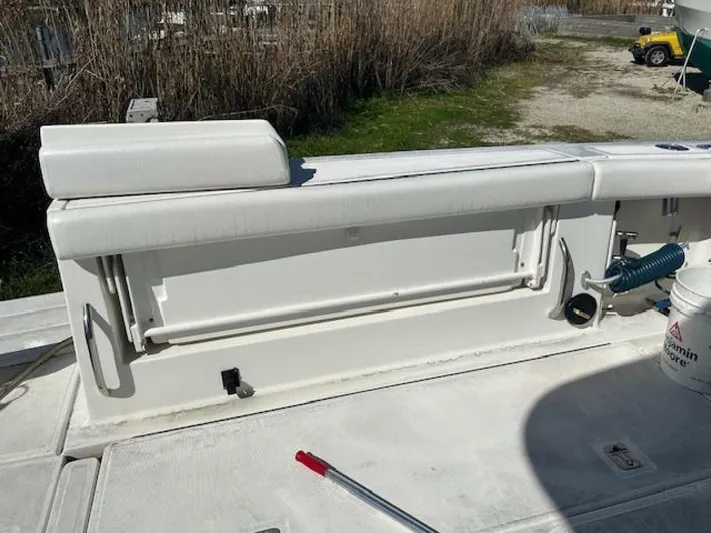 Absolutely Yacht Photos Pics 2006 Tiara Yachts Open boat deck with seating and storage compartment.