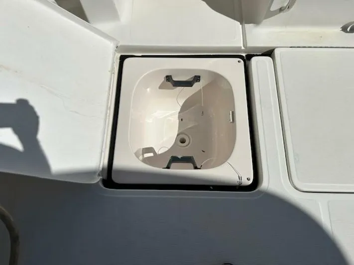 Absolutely Yacht Photos Pics Open storage compartment on a 2006 Tiara Yachts Open boat deck.