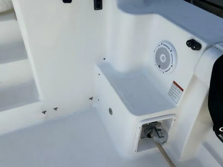 Absolutely Yacht Photos Pics 2006 Tiara Yachts Open boat deck with speaker and rope storage.