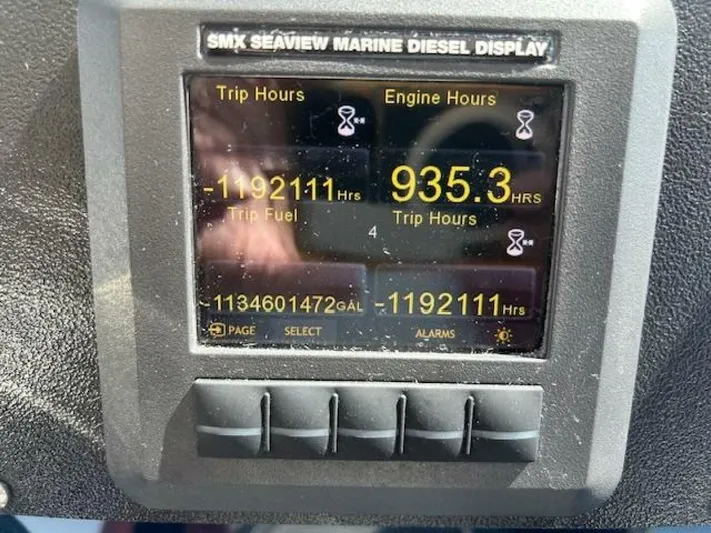 Absolutely Yacht Photos Pics Display panel showing trip and engine hours on a 2006 Tiara Yachts Open.