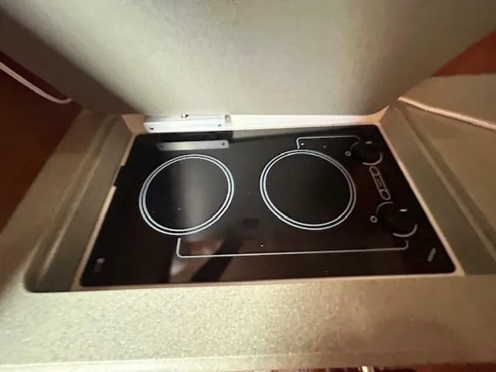 Absolutely Yacht Photos Pics Stovetop in 2006 Tiara Yachts Open, featuring dual burners and sleek design.