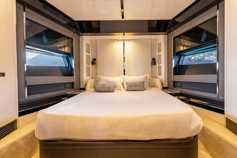  Yacht Photos Pics Luxurious bedroom interior of 2023 Azimut S8 yacht with modern design and elegant bedding.