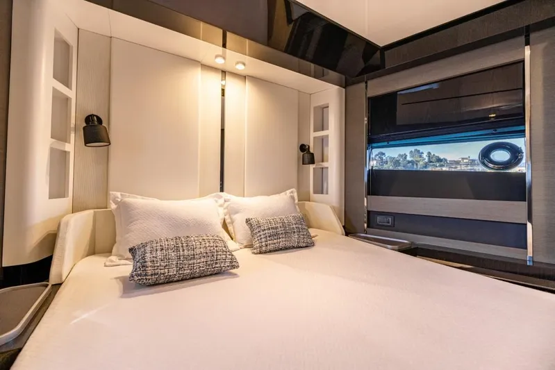  Yacht Photos Pics Luxurious bedroom interior of 2023 Azimut S8 yacht with modern design and elegant bedding.