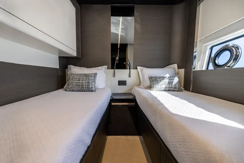  Yacht Photos Pics Luxurious twin cabin interior of 2023 Azimut S8 yacht with modern design and elegant bedding.