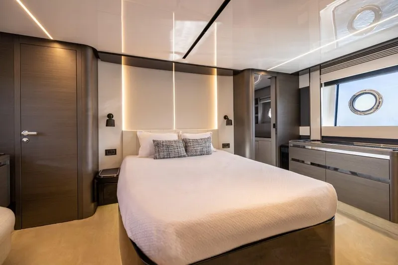  Yacht Photos Pics Luxurious bedroom interior of 2023 Azimut S8 yacht with modern design and elegant furnishings.