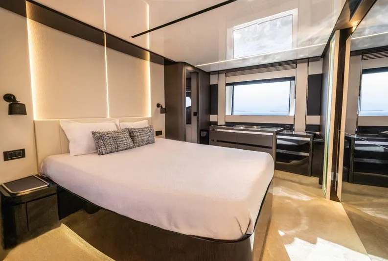  Yacht Photos Pics Luxurious bedroom interior of 2023 Azimut S8 yacht with modern design and large windows.