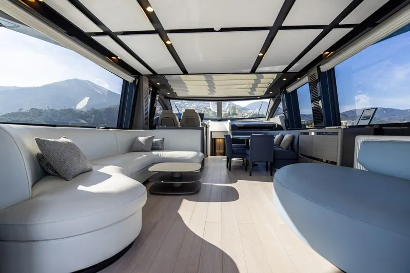  Yacht Photos Pics Luxurious interior of 2023 Azimut S8 yacht with modern seating and panoramic windows.
