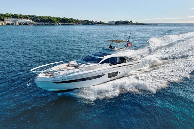  Yacht Photos Pics 2023 Azimut S8 yacht cruising on open water, showcasing sleek design and luxury.