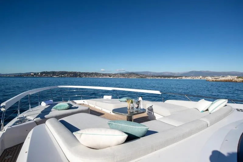  Yacht Photos Pics Luxurious 2023 Azimut S8 yacht deck with elegant seating and ocean view.