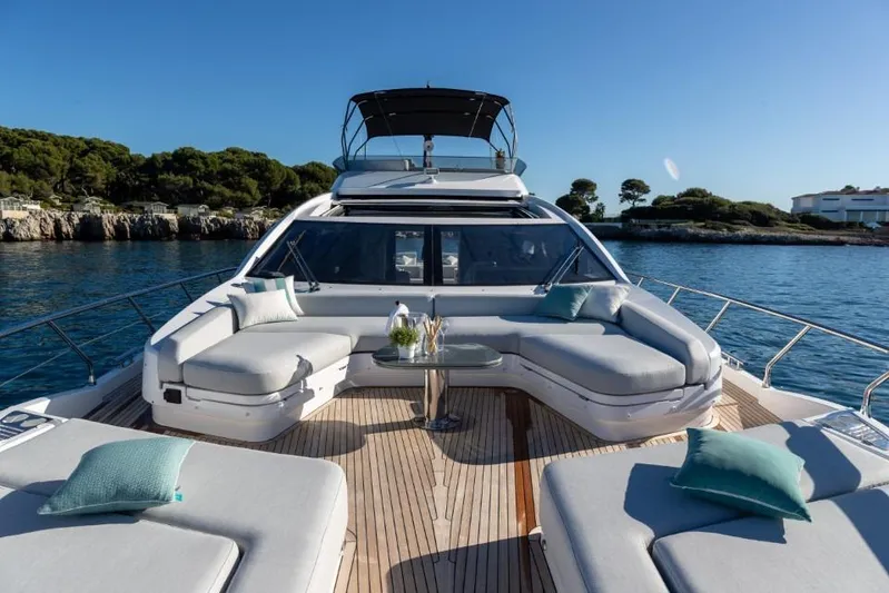  Yacht Photos Pics Luxurious 2023 Azimut S8 yacht with elegant deck seating and scenic ocean view.