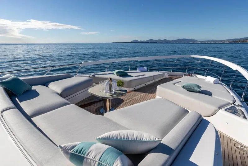  Yacht Photos Pics Luxurious 2023 Azimut S8 yacht deck with elegant seating and ocean view.