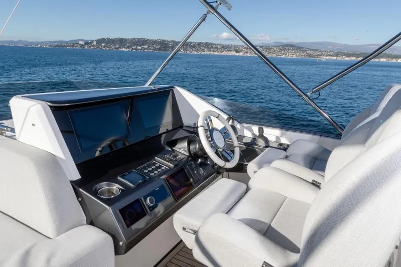  Yacht Photos Pics 2023 Azimut S8 yacht helm with modern controls and ocean view.
