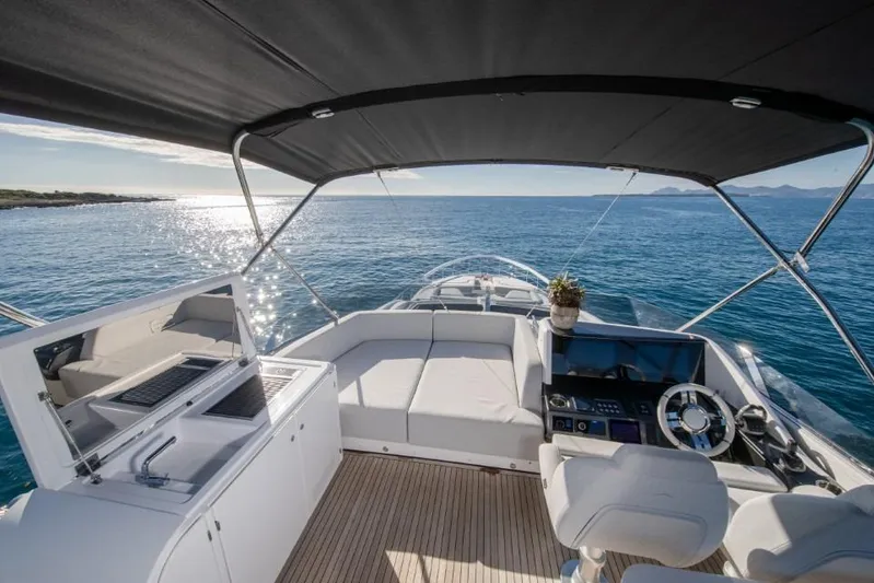  Yacht Photos Pics 2023 Azimut S8 yacht cockpit with luxurious seating and ocean view.