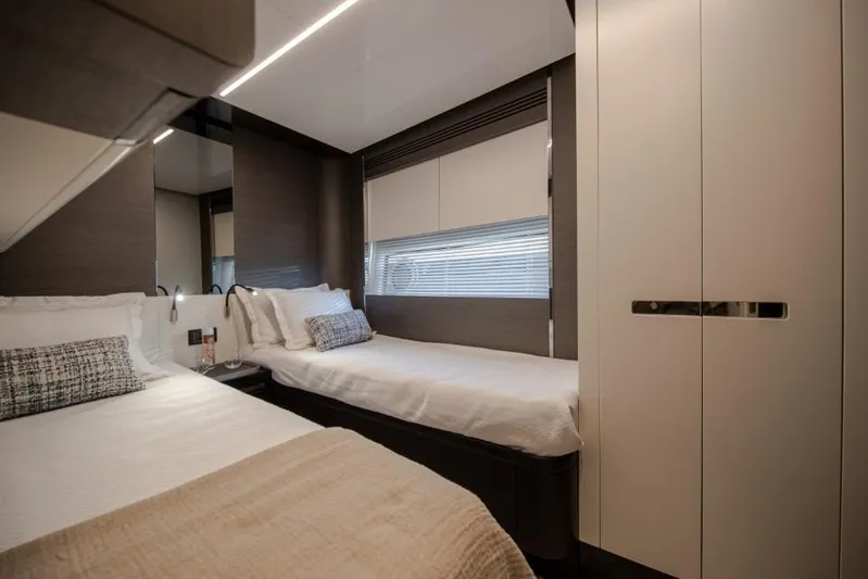  Yacht Photos Pics Luxurious cabin interior of 2023 Azimut S8 yacht with twin beds and modern decor.