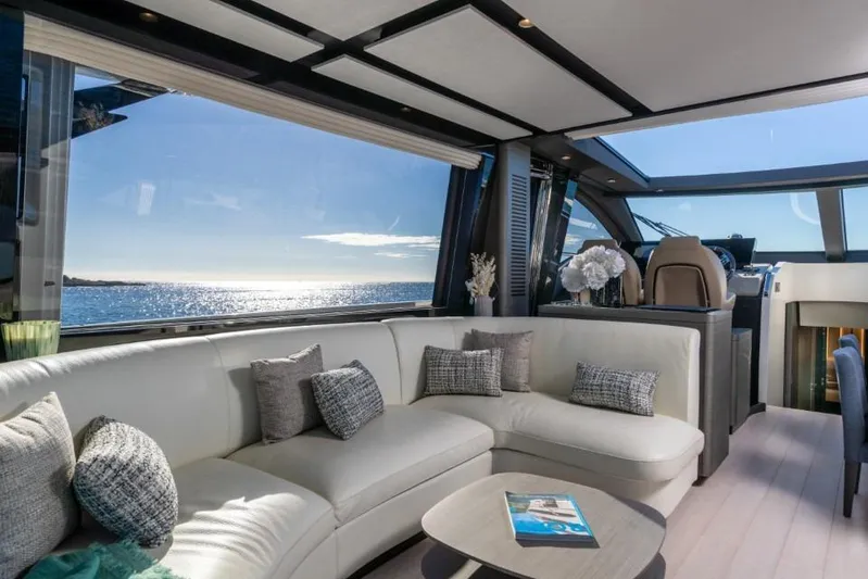  Yacht Photos Pics Luxurious interior of 2023 Azimut S8 yacht with ocean view and elegant seating.