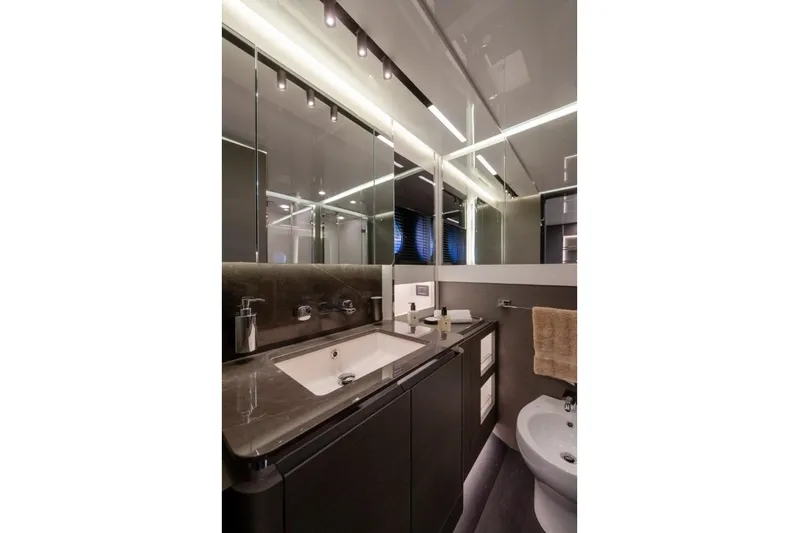  Yacht Photos Pics Luxurious bathroom in 2023 Azimut S8 yacht with modern fixtures and elegant design.