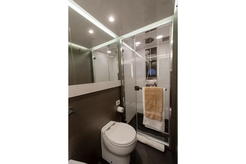  Yacht Photos Pics Luxurious bathroom in 2023 Azimut S8 yacht with modern fixtures and elegant design.