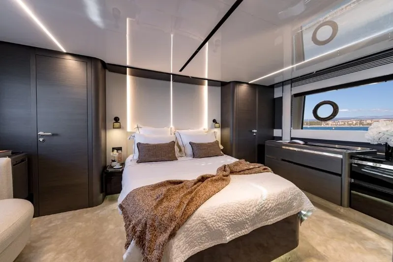  Yacht Photos Pics Luxurious bedroom interior of 2023 Azimut S8 yacht with modern design and sea view.