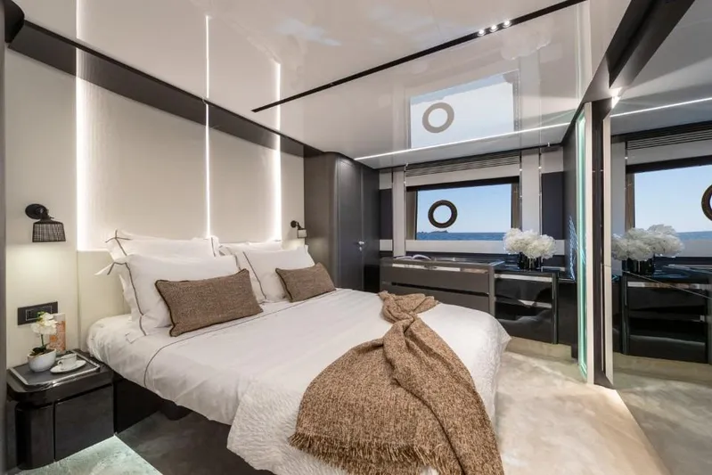  Yacht Photos Pics Luxurious bedroom interior of 2023 Azimut S8 yacht with elegant decor and ocean view.