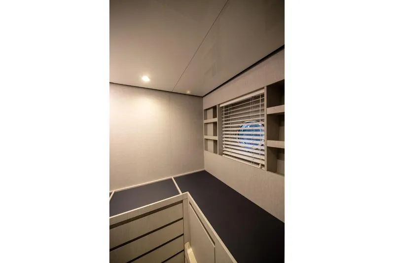  Yacht Photos Pics Interior of 2023 Azimut S8 yacht, featuring modern design and porthole window.