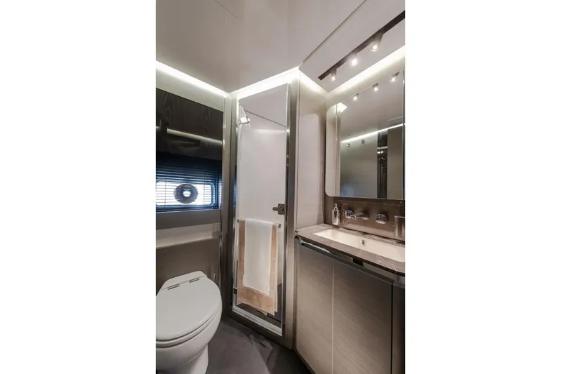 Yacht Photos Pics Luxurious 2023 Azimut S8 yacht bathroom with modern fixtures and elegant lighting.