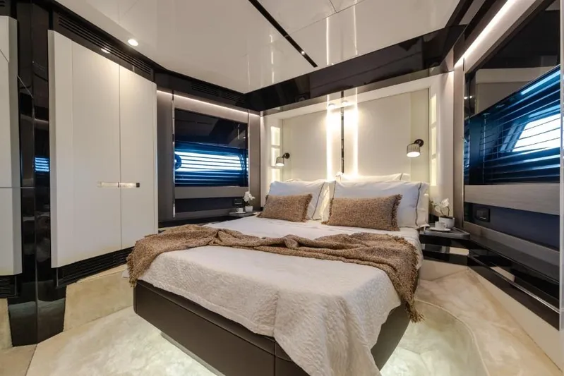  Yacht Photos Pics Luxurious bedroom interior of 2023 Azimut S8 yacht, featuring modern design and elegant lighting.