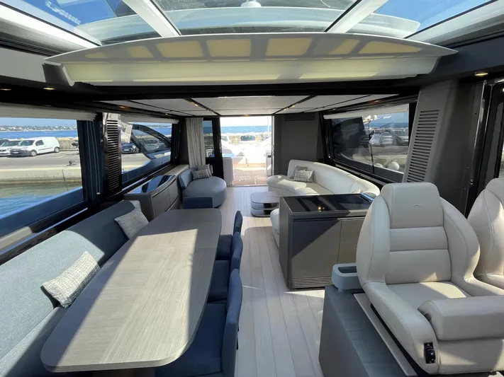  Yacht Photos Pics Luxurious interior of 2023 Azimut S8 yacht with spacious seating and panoramic windows.