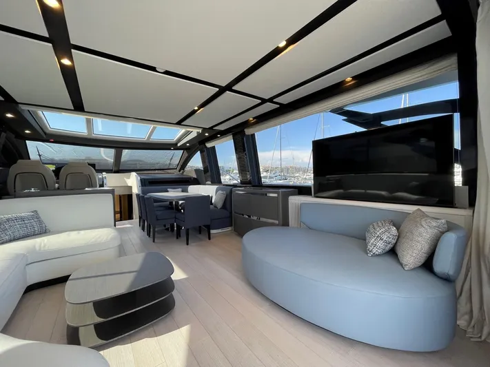  Yacht Photos Pics Luxurious interior of 2023 Azimut S8 yacht with modern seating and panoramic windows.