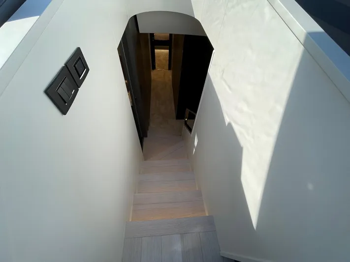  Yacht Photos Pics Staircase inside 2023 Azimut S8 yacht, featuring modern design and sleek finishes.