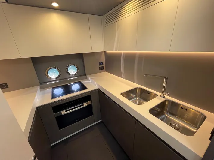  Yacht Photos Pics Modern kitchen in 2023 Azimut S8 yacht with dual sinks and sleek design.