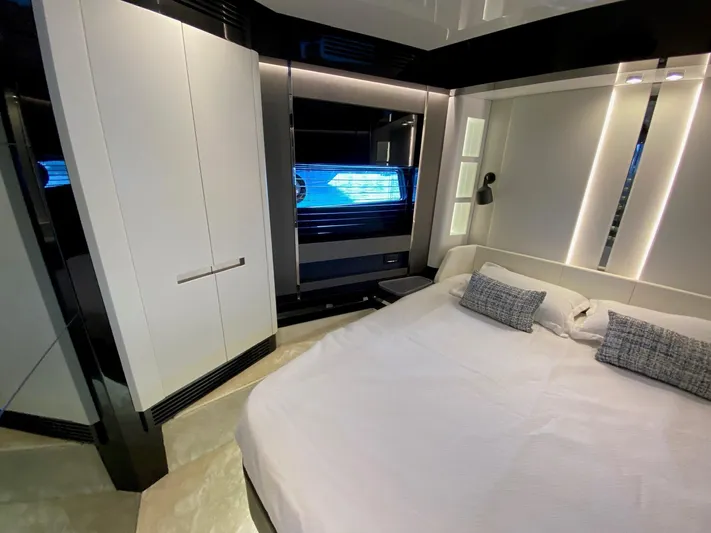  Yacht Photos Pics Luxurious bedroom interior of 2023 Azimut S8 yacht with modern design and elegant lighting.