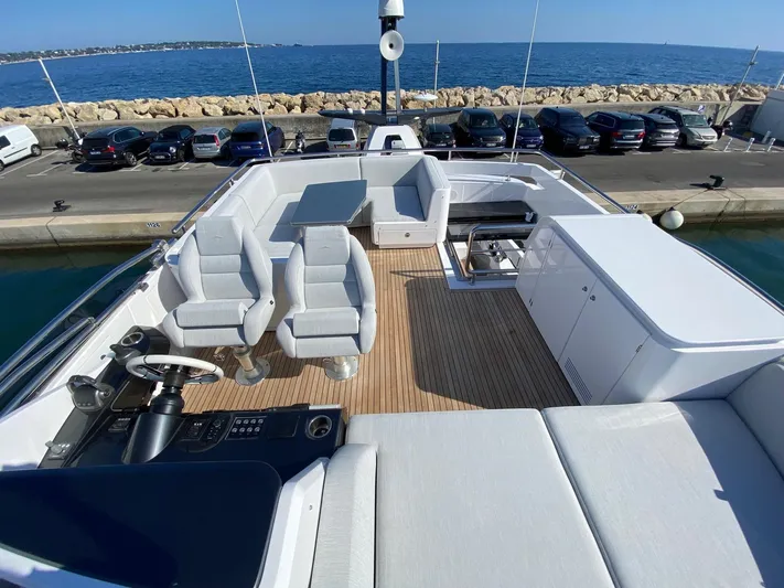 Yacht Photos Pics 2023 Azimut S8 yacht deck with luxurious seating and ocean view.