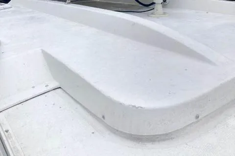 Tootles Yacht Photos Pics 2016 Ranger Tugs R-31 boat deck, showcasing sleek white design and structure.