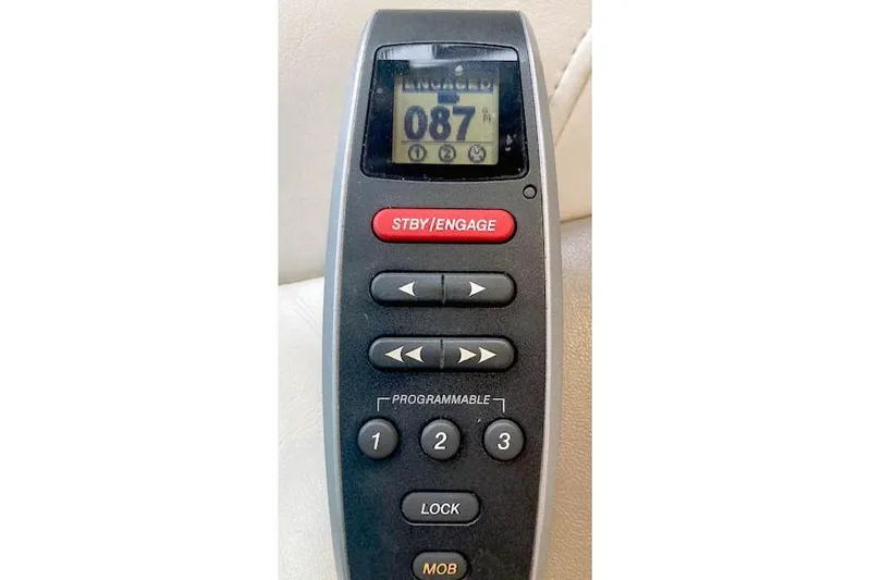 Tootles Yacht Photos Pics Remote control for 2016 Ranger Tugs R-31 boat, featuring navigation and programmable buttons.